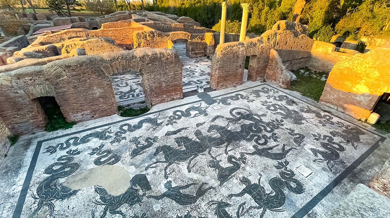 What are the must-see highlights at Ostia Antica on a day tour from Rome